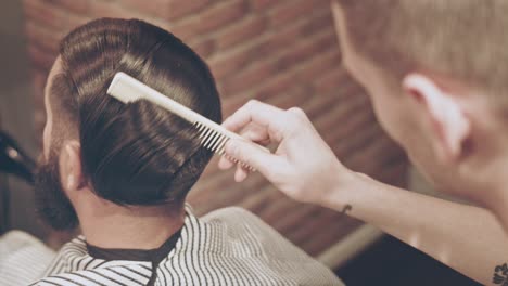 Male-hairstyle.-Barber-haircut.-Man-hairstyle.-Barber-comb-client